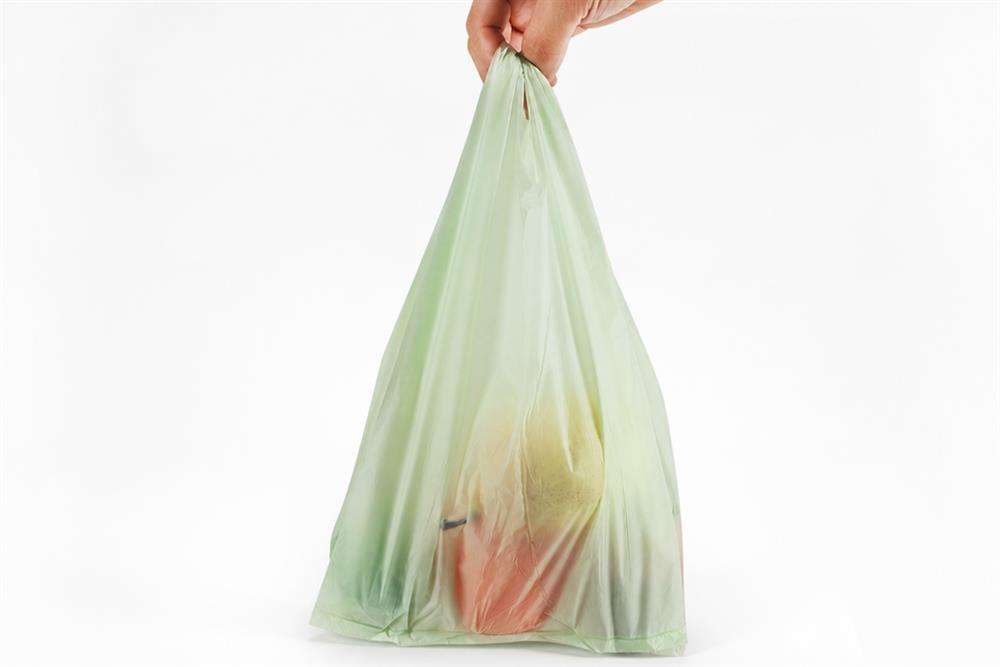 PBAT compostable shopping bag with fresh fruit — blown film biodegradable packaging made from PBAT pellets
